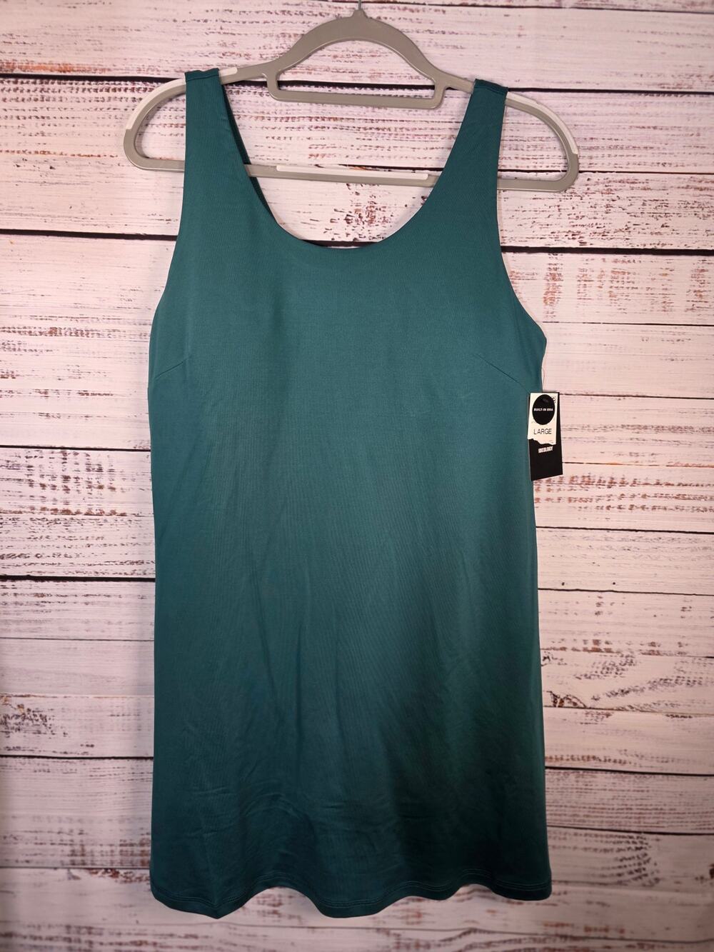 Ideology solid performance dress/skort with pockets size Large NWT Build in bra